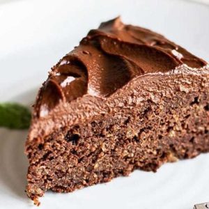 Light, fluffy chocolate quinoa cake with a smooth dark crumb, sliced to show texture.
